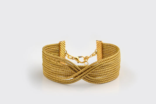 Bracelet en or végétal, fibre dorée tressée et croisée